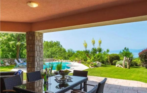 Stunning home in Kostrena with WiFi, Outdoor swimming pool and 4 Bedrooms